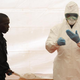A Senegalese hygienist demonstrates how to protect oneself against the Ebola virus on April 8, 2014, at Dakar airport, during a visit of the Senegalese health minister to check the safety measures put in place to fight against the virus’ spread in western Africa.
SEYLLOU/AFP/Getty Images